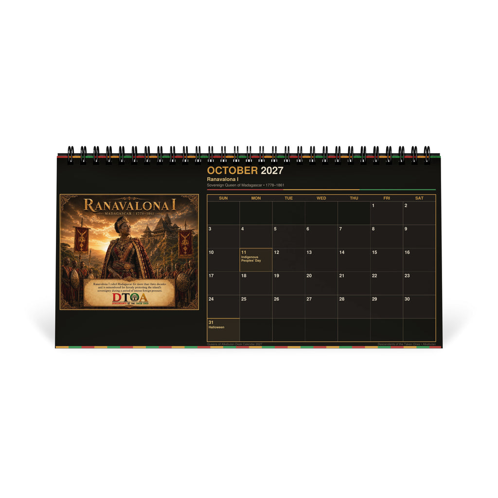 Queens of Alkebulan 2027 desktop calendar — product photo showing the calendar on a desk