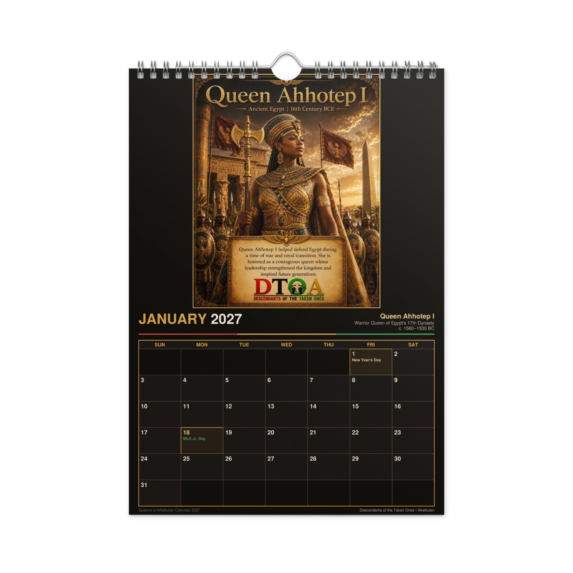 Queens of Alkebulan 2027 wall calendar, Black & Gold Edition — product photo showing the gold print detail